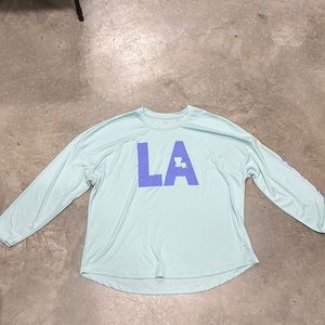 State‎ of mine Louisiana light green w/ purple LA on front poly shirt / Size 2XL